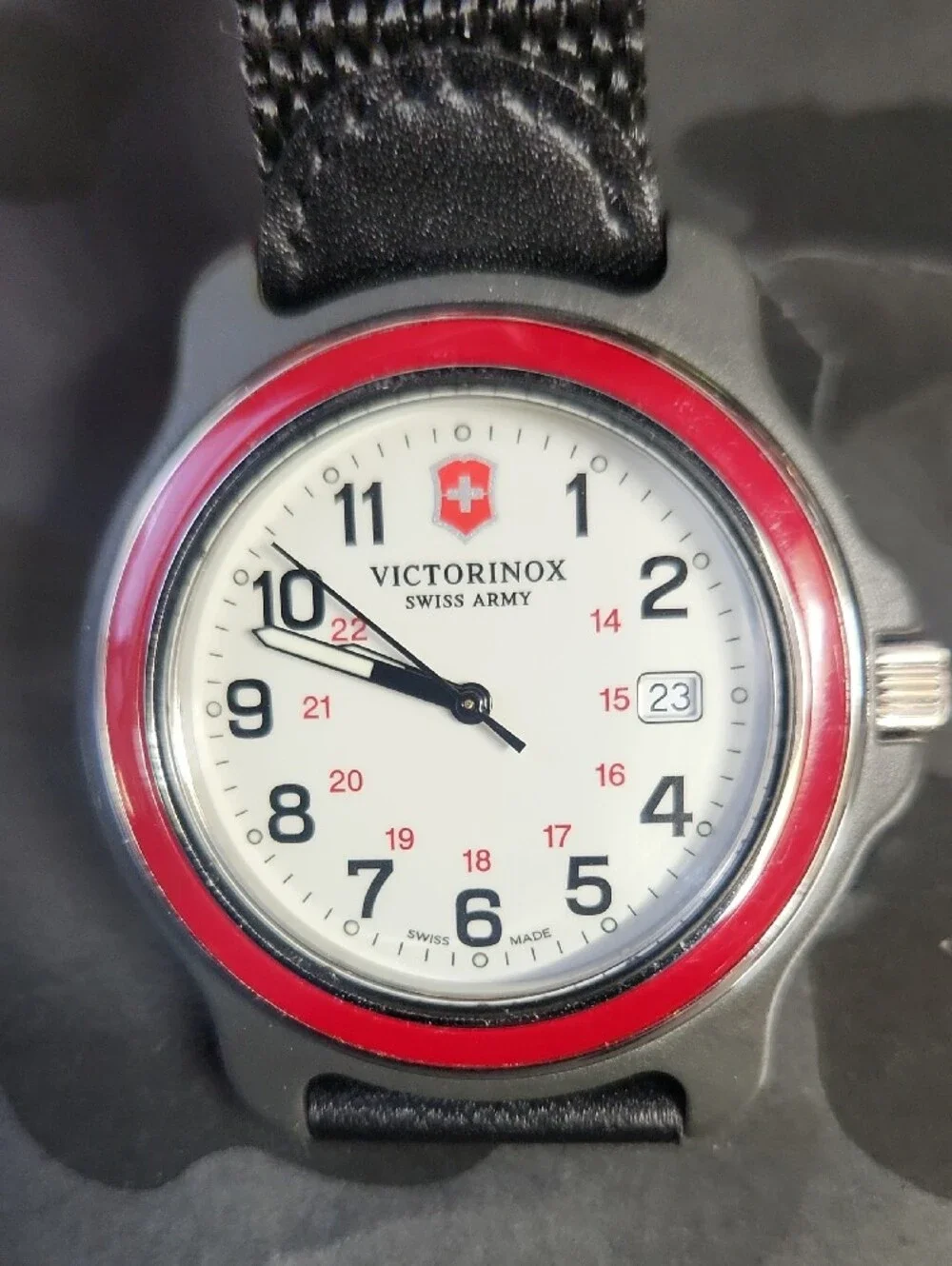 Victorinox Red-Bezel Silver Field Watch with Black Strap